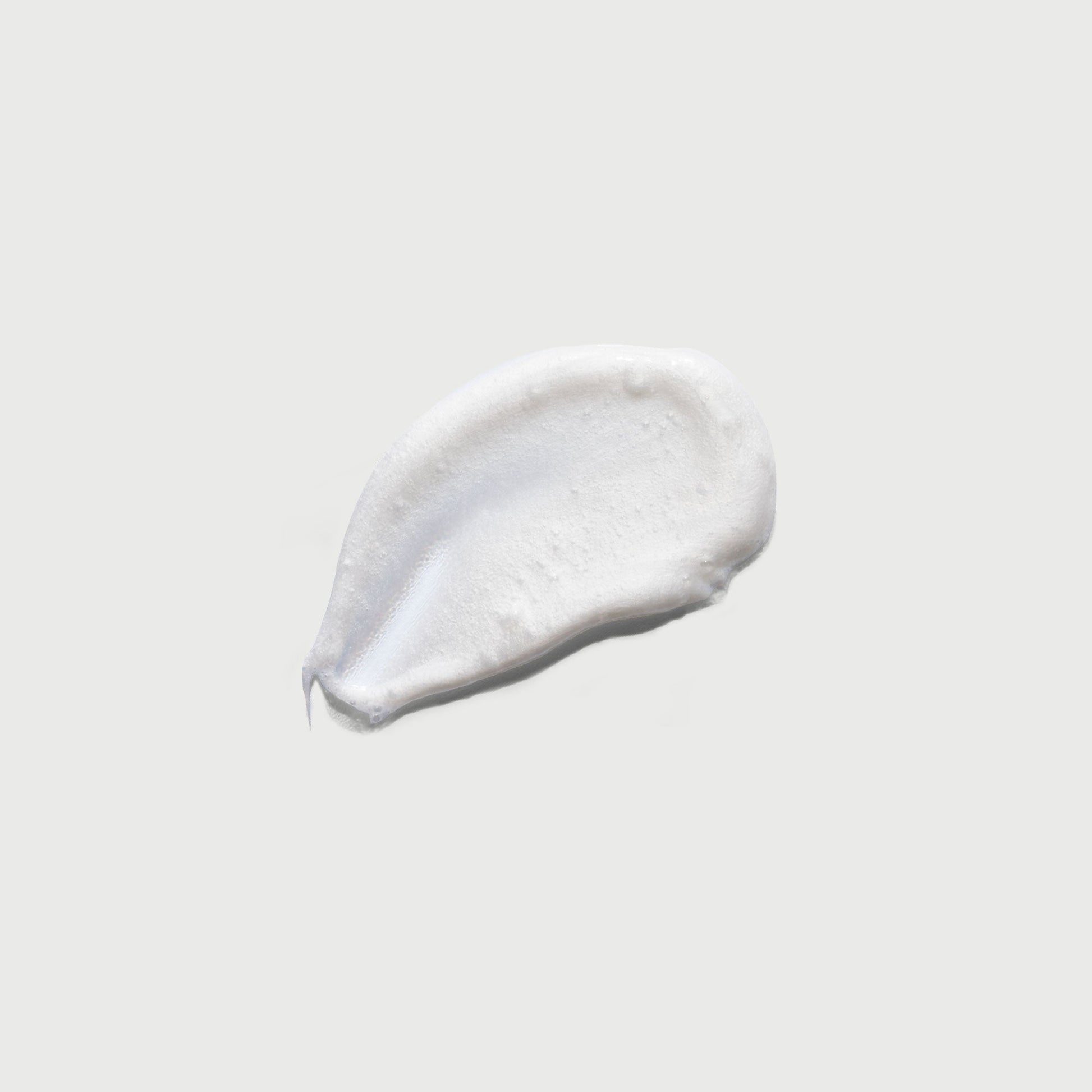 the-smoother-glycolic-acid-exfoliating-body-wash-t1 NATR-40002-Swatch-The-Smoother-Glycolic-Acid-Exfoliating-Body-Wash-bonebkgd.jpg