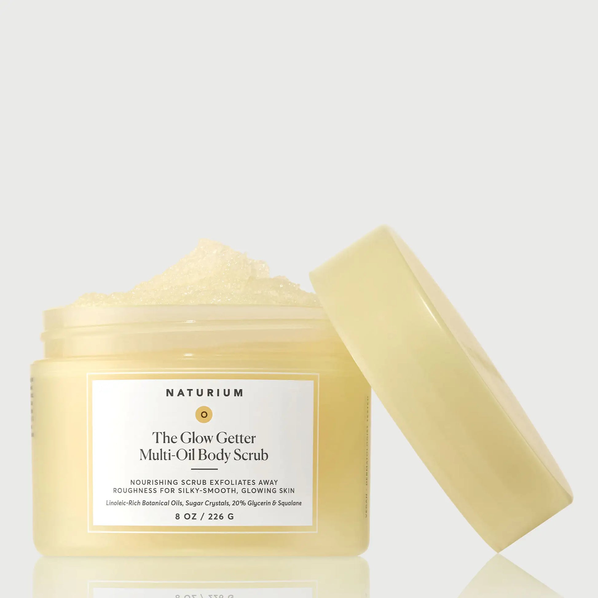 the-glow-getter-multi-oil-body-scrub-o9 NATR-40028-GlowGetter-Multi-Oil-Body-Scrub-Front-CapOff-bonebkgd.webp