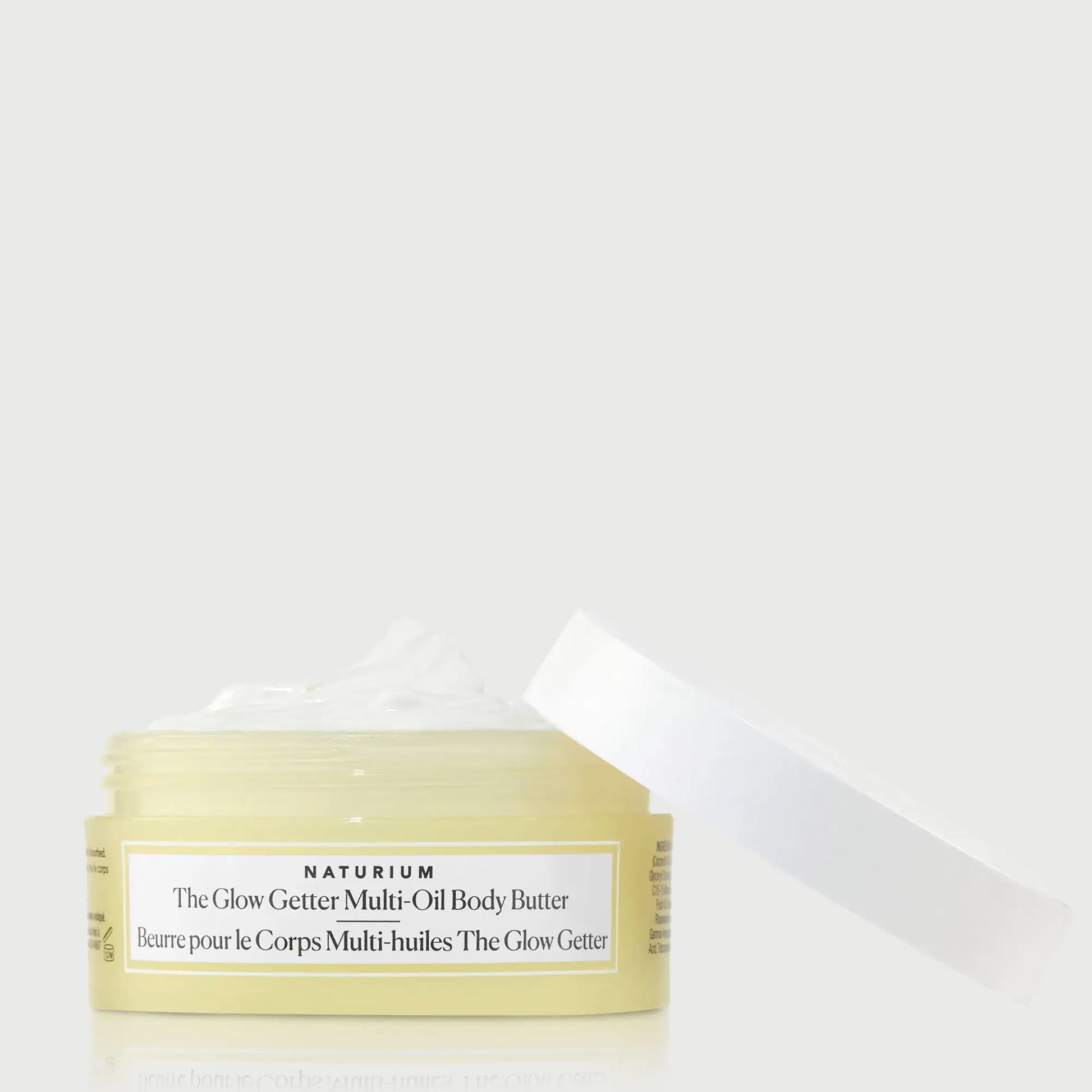 the-glow-getter-multi-oil-body-butter-travel-size-t9 NATR-40115_Glow-Getter-Body-Butter-Mini_front_capoff_bonebkgd.webp
