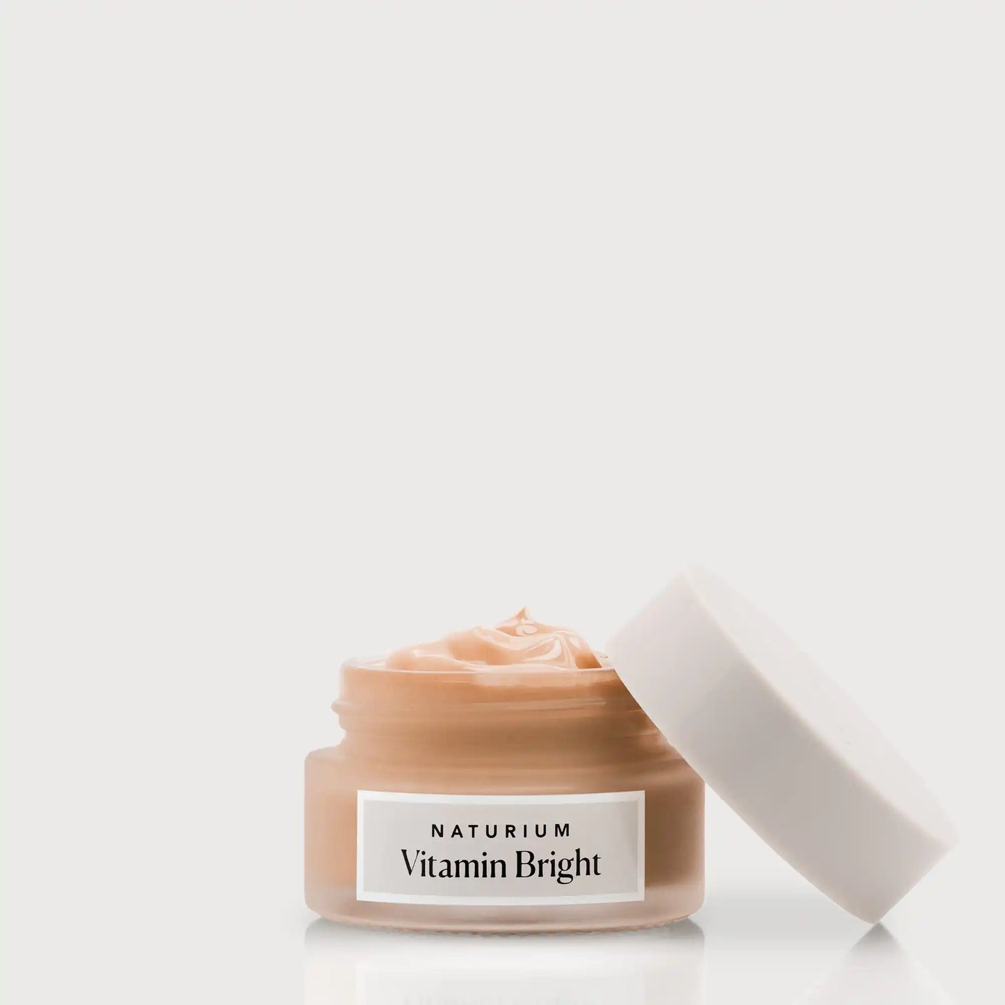 vitamin-bright-illuminating-eye-cream-i2 NATR-VitaminBright_DEEP_Primary_front_openjar_bone.webp