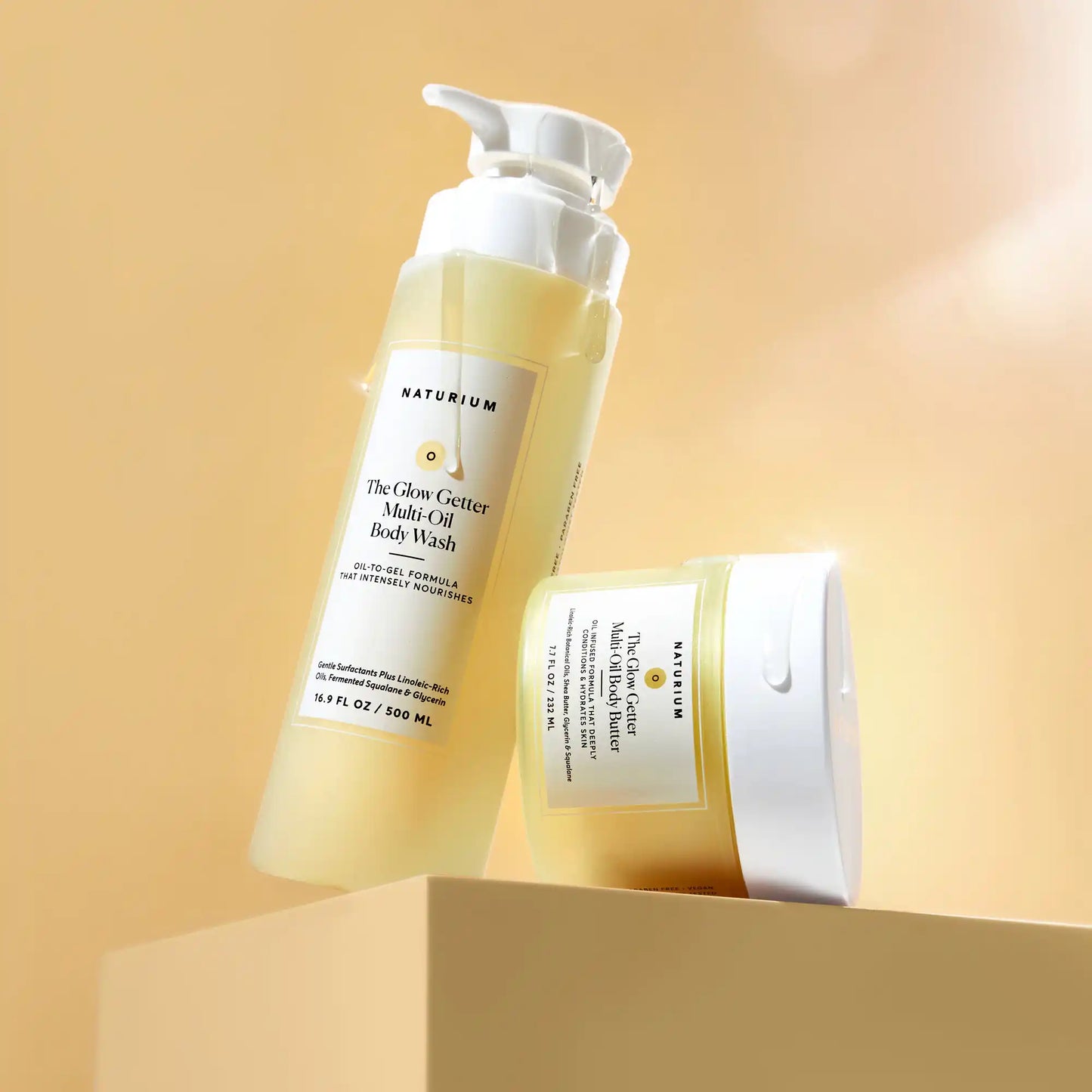 the-glow-all-out-body-bundle-d9 gg-bodybutter_1464-crop_revcolor_FL.webp